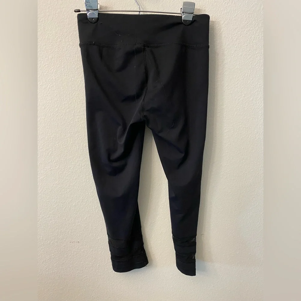 Live love Dream from Aeropostale black leggings with mesh detail. Size Medium.